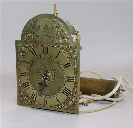 A 17th century style brass lantern clock signed Wm Peck of Bolnhurst 18cm